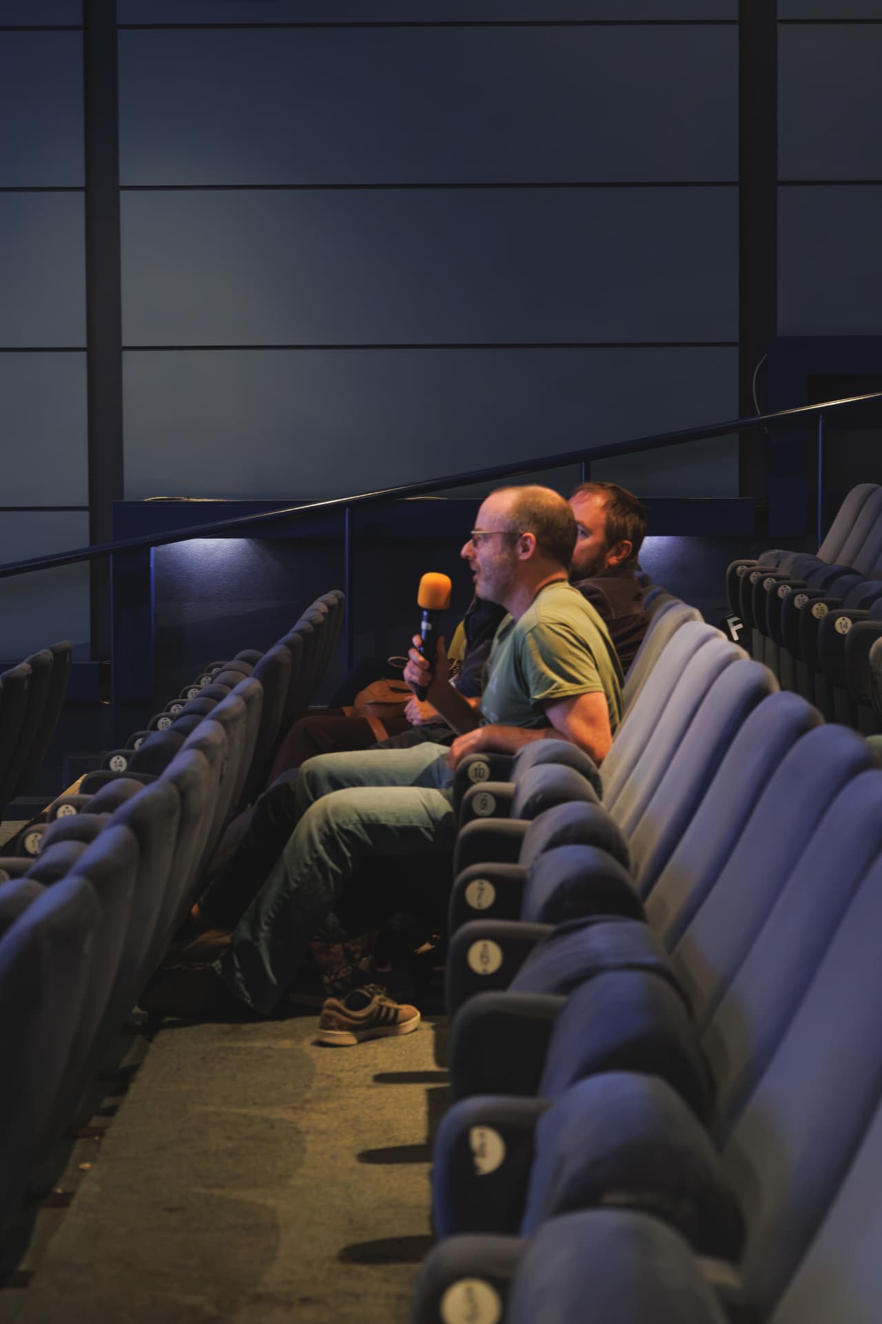 An audience member asks a question from the back rows, Chapter Arts Centre, Cardiff