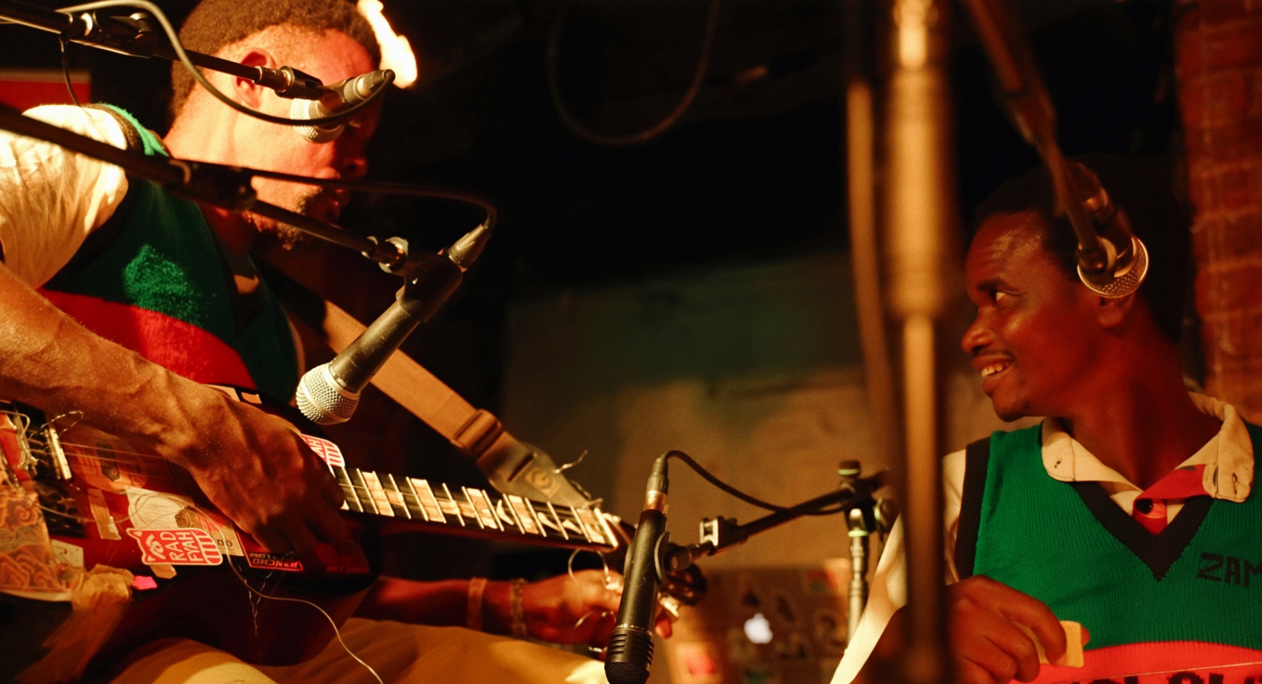 Madalitso Band members performing — guitarist and bassist sharing a moment on stage at the Troubadour, London