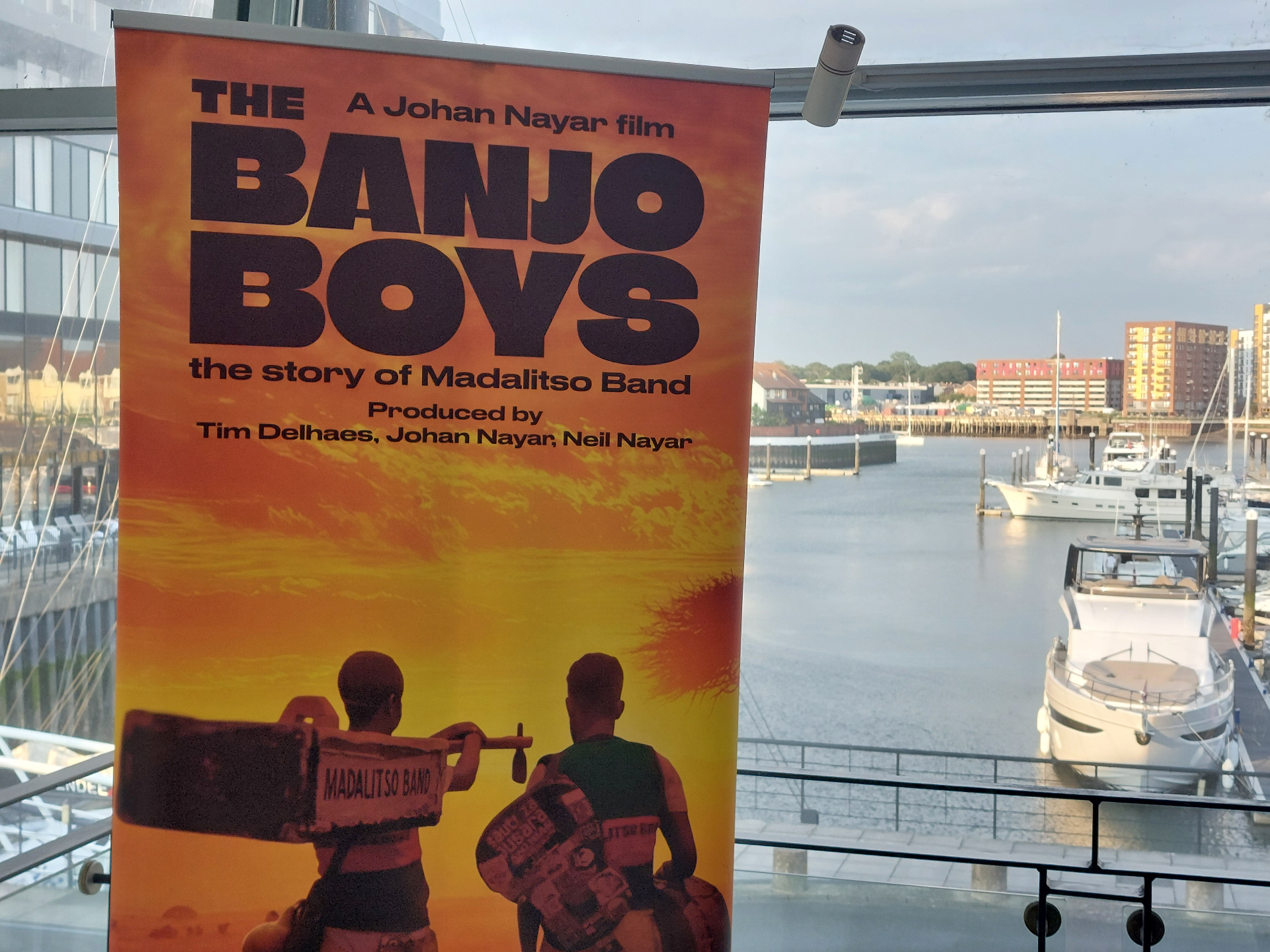 View over Harbour Lights with the Banjo Boys poster at The Madalitso Experience at Harbour Lights, Southampton