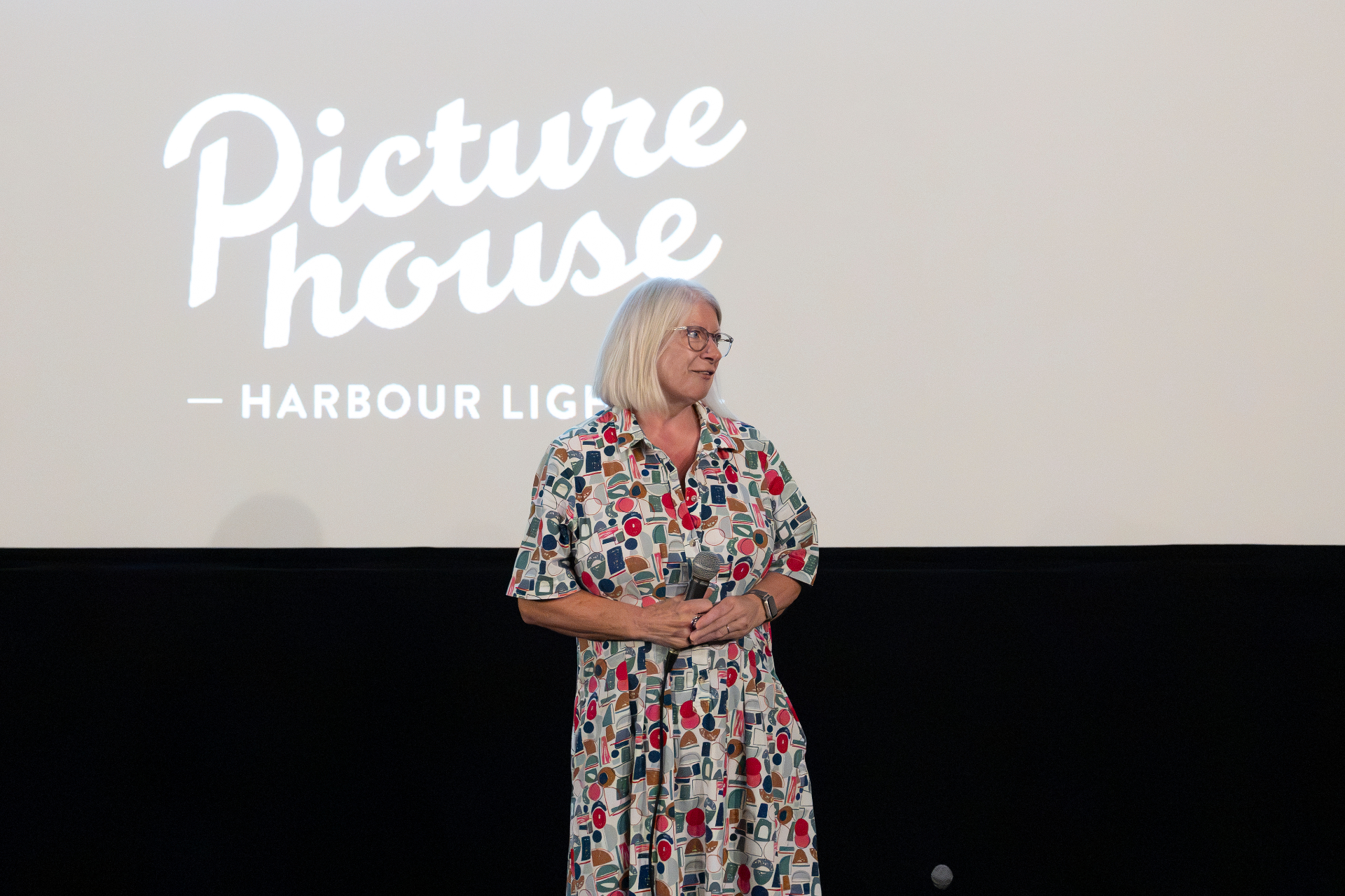 Susan Beckett of City Eye Film Network on stage at The Madalitso Experience at Harbour Lights, Southampton