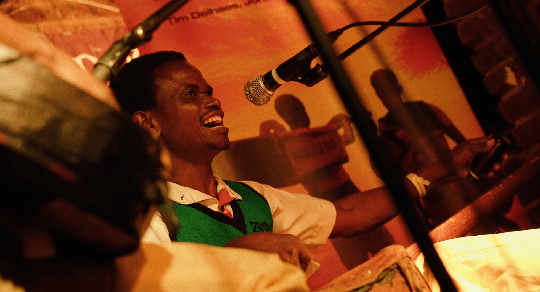 Madalitso Band vocalist laughing on stage at The Madalitso Experience at the Troubadour, London