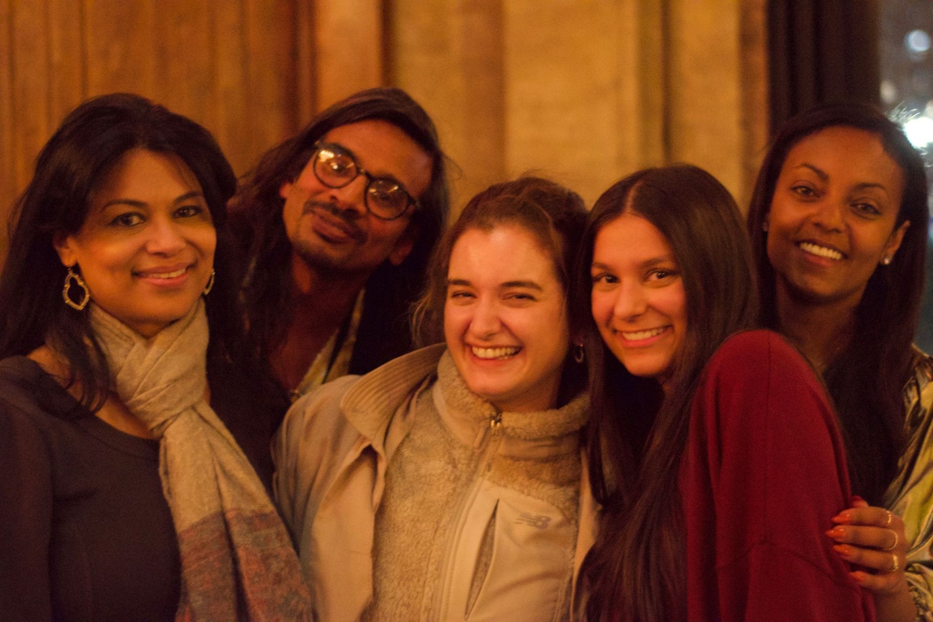 Group portrait of guests and filmmakers at the ADIFF evening reception
