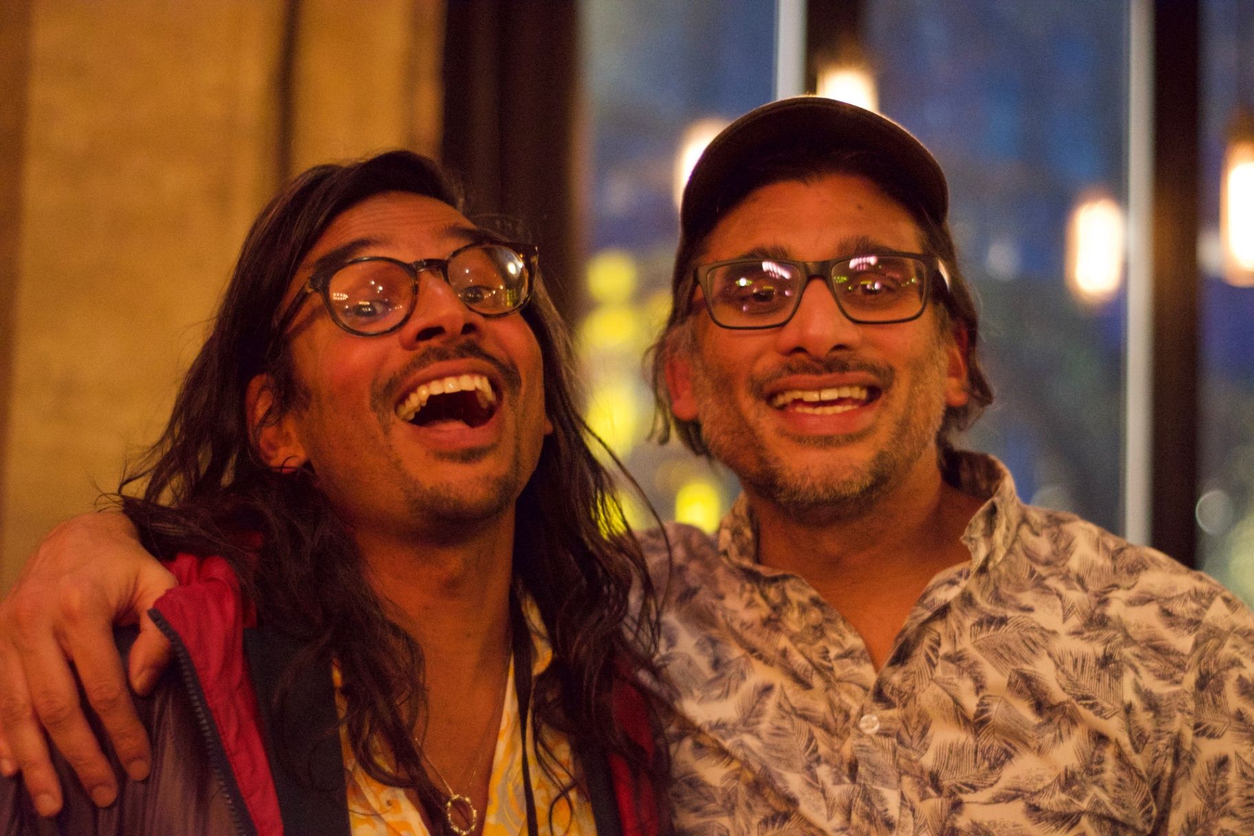 Director Johan Nayar sharing a laugh with a guest at the ADIFF reception
