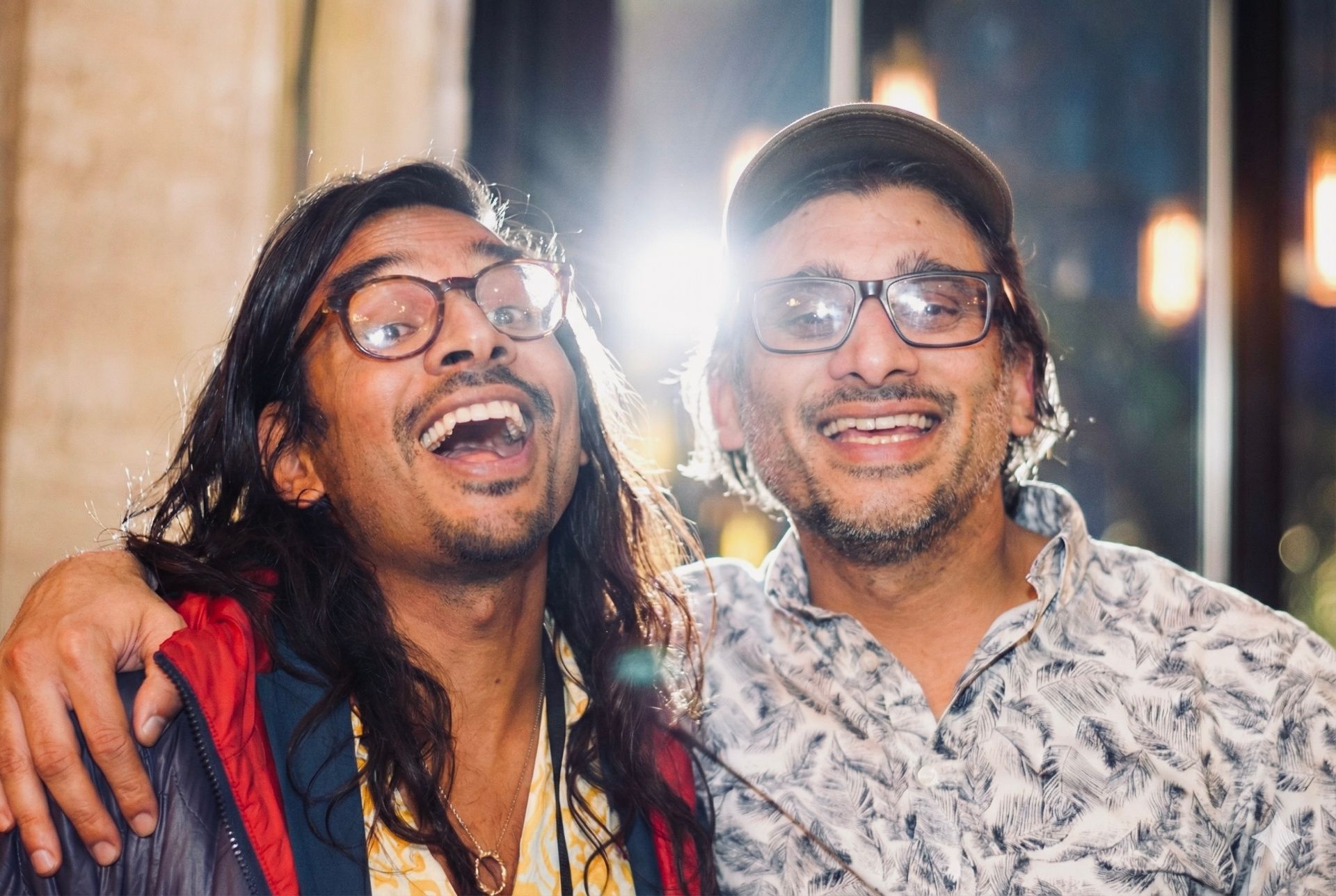 Director Johan Nayar and Neil Nayar laughing together in a New York pub after the ADIFF international premiere