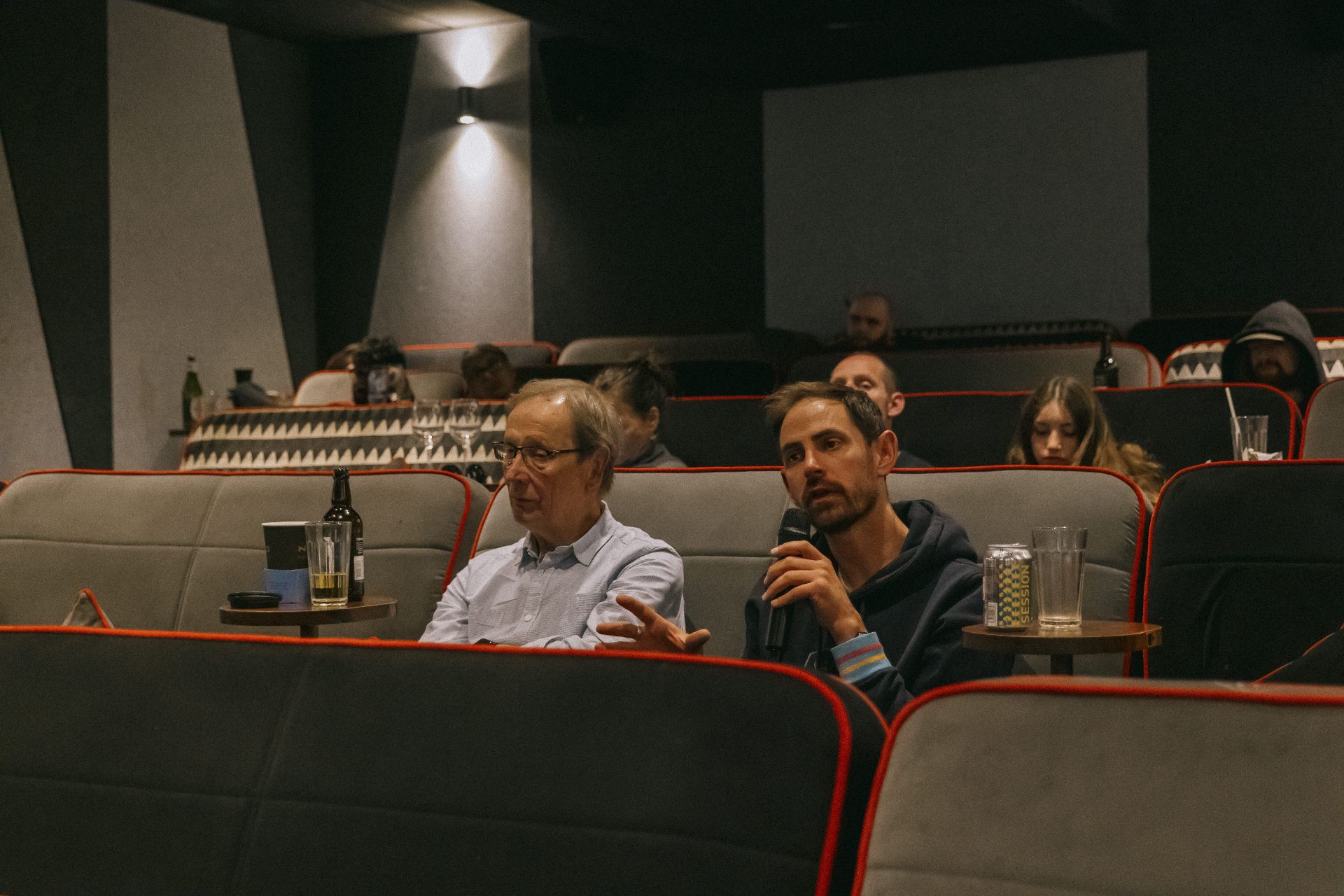 Audience member asking a question during the Q&A at the Bristol screening of The Banjo Boys