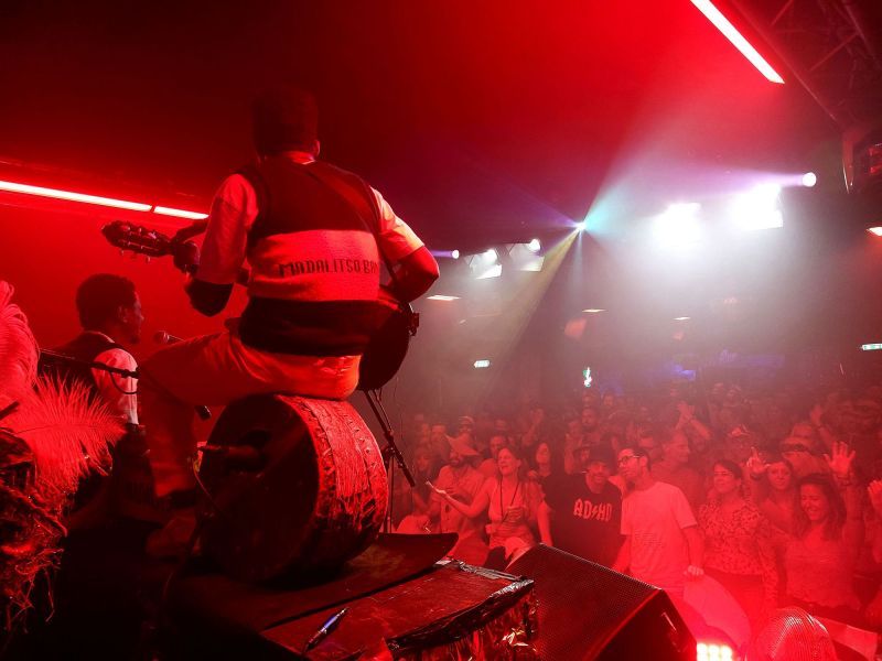 Madalitso Band performing to a packed crowd at HMS Sweet Charity, Glastonbury 2023