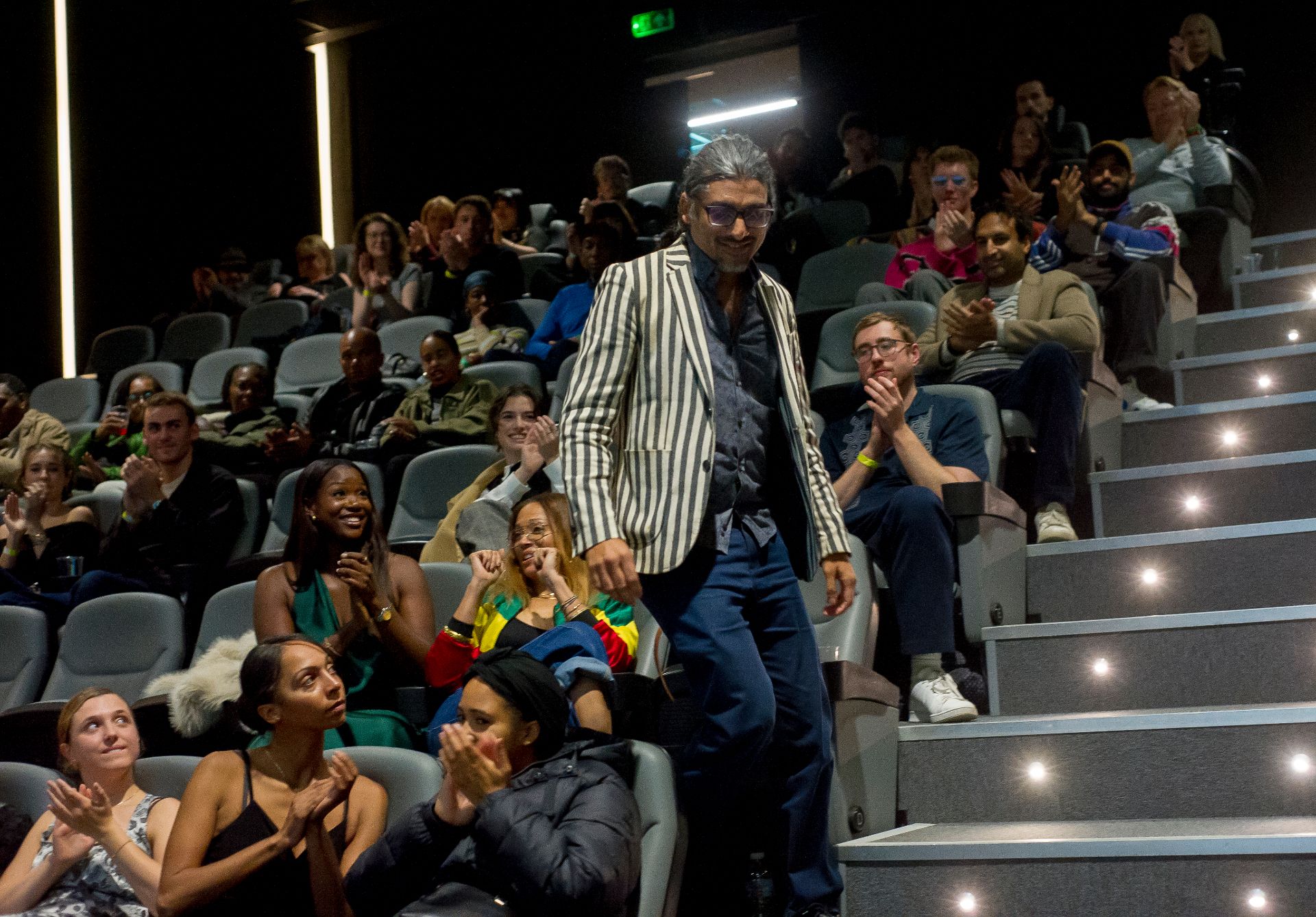 Johan Nayar (director/producer) receiving the Audience Award at London Breeze Film Festival Awards Night — 26 Oct 2025