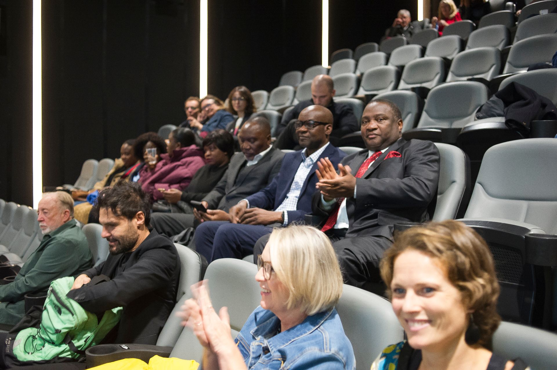 Audience members including representatives from the Malawian Embassy and Dan Trovato at the London Breeze world premiere — 22 Oct 2025