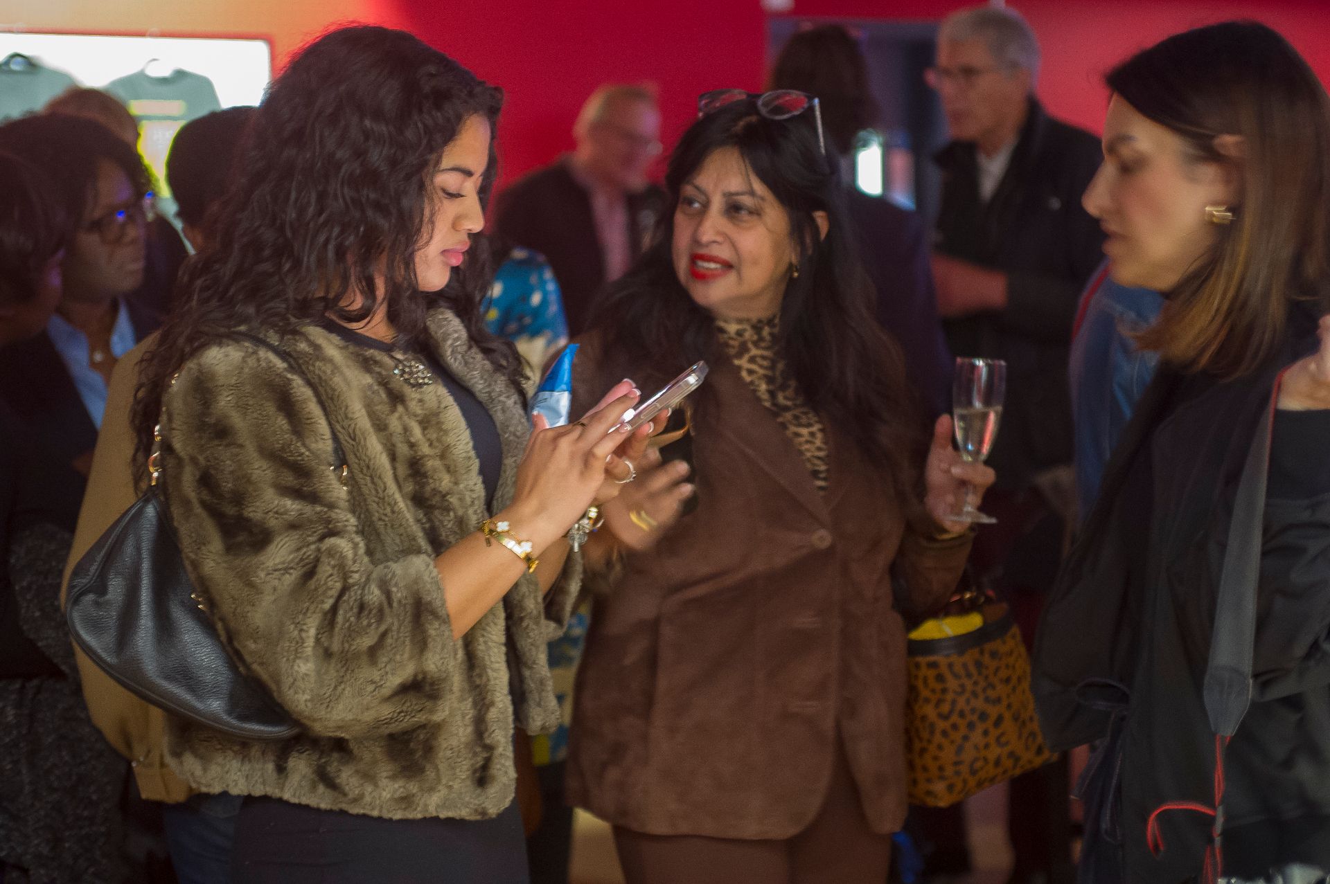 Guests mingling in the foyer at the London Breeze world premiere — 22 Oct 2025