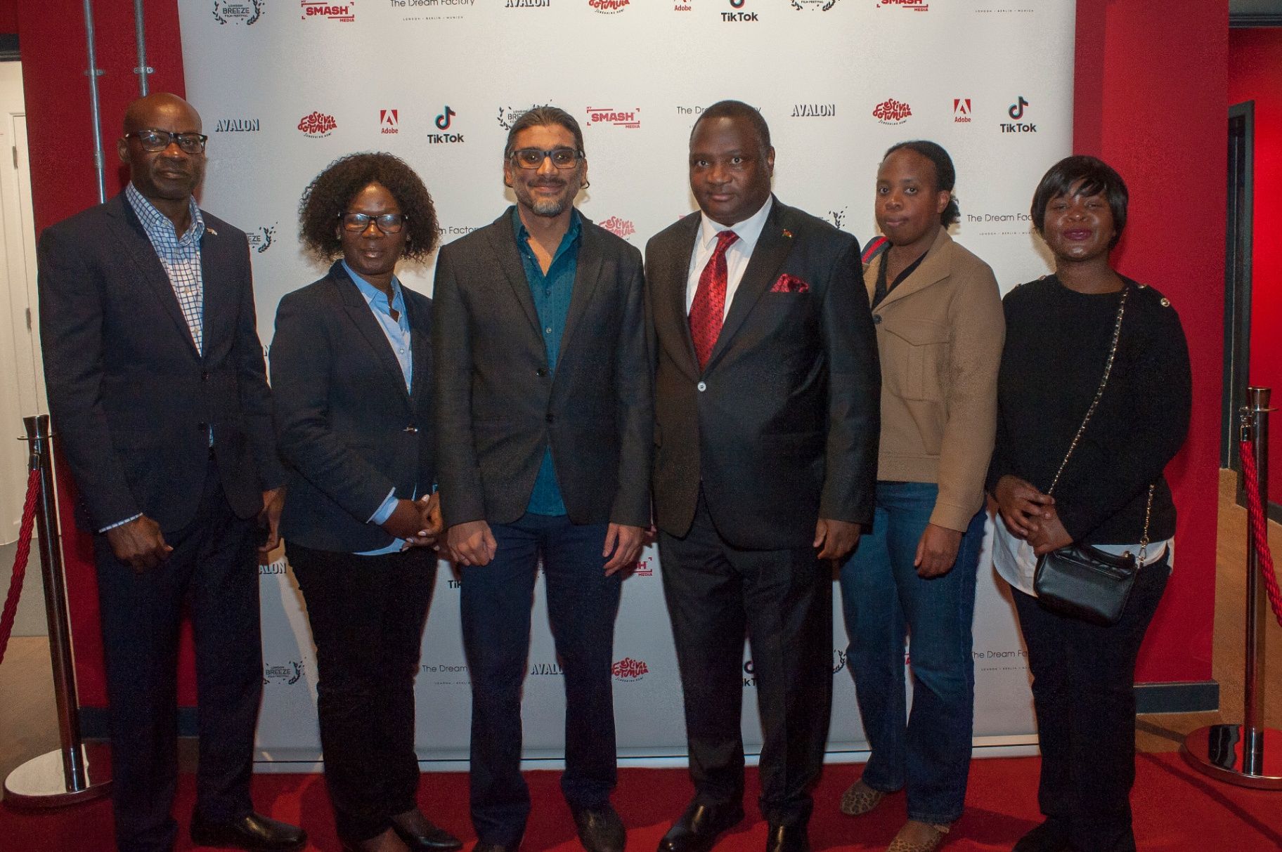 Group portrait on the red carpet at the London Breeze world premiere — 22 Oct 2025