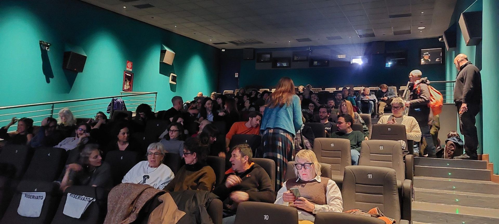 Audience gathering before the Seeyousound screening in Turin, Italy