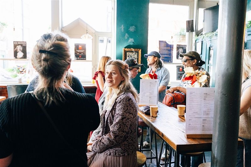 Guests mingling in the pub before the Unrestricted View Film Festival 2026 screening